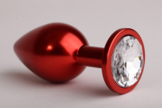 Металлическая пробка красного цвета с прозрачным кристаллом